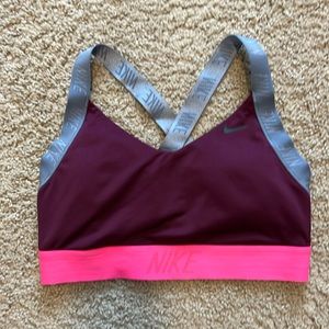 Pink and purple Nike sports bra